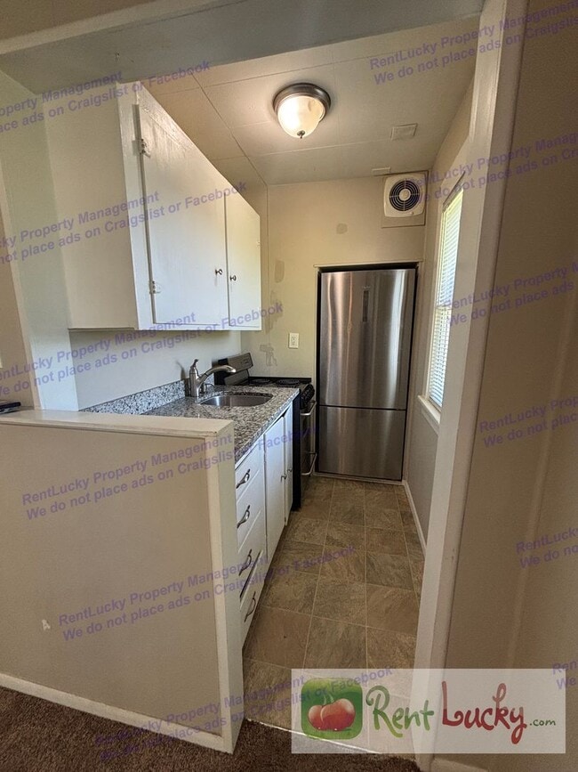 Photo - Singh Tacoma 4-Plex Unit 1