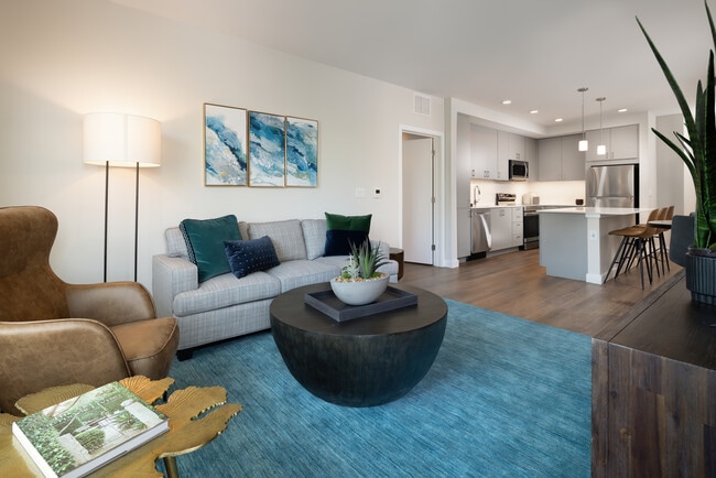 Living and dining areas with hard surface flooring throughout - Avalon Brighton Apartments