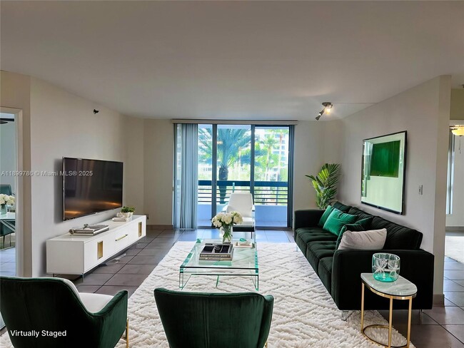 Building Photo - 3600 Mystic Pointe Dr Unit 511