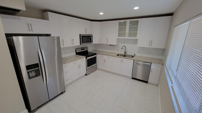Building Photo - 6289 Lear Dr Unit 203