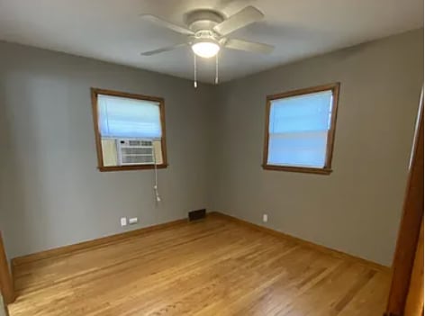 Bedroom with Window Air Conditioner. - 1028 S 24th St Unit 1028 S 24th Street
