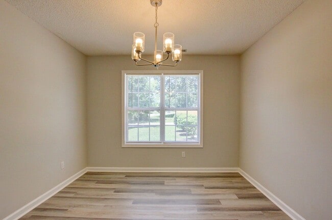 Photo - Stunning Brick Front Home With Fireplace And Hardwood Flooring In Sango Area
