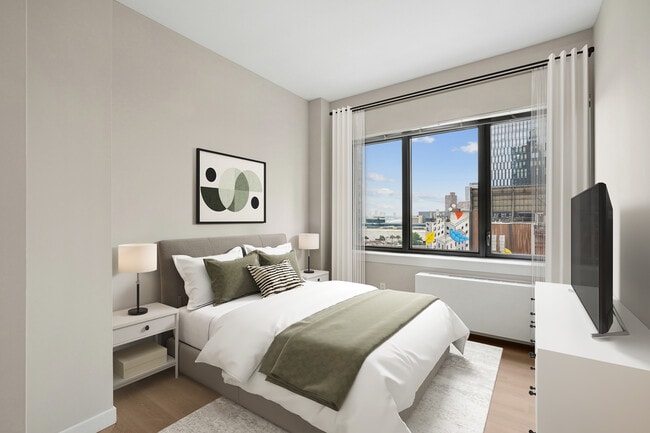 Bedroom with hard surface flooring