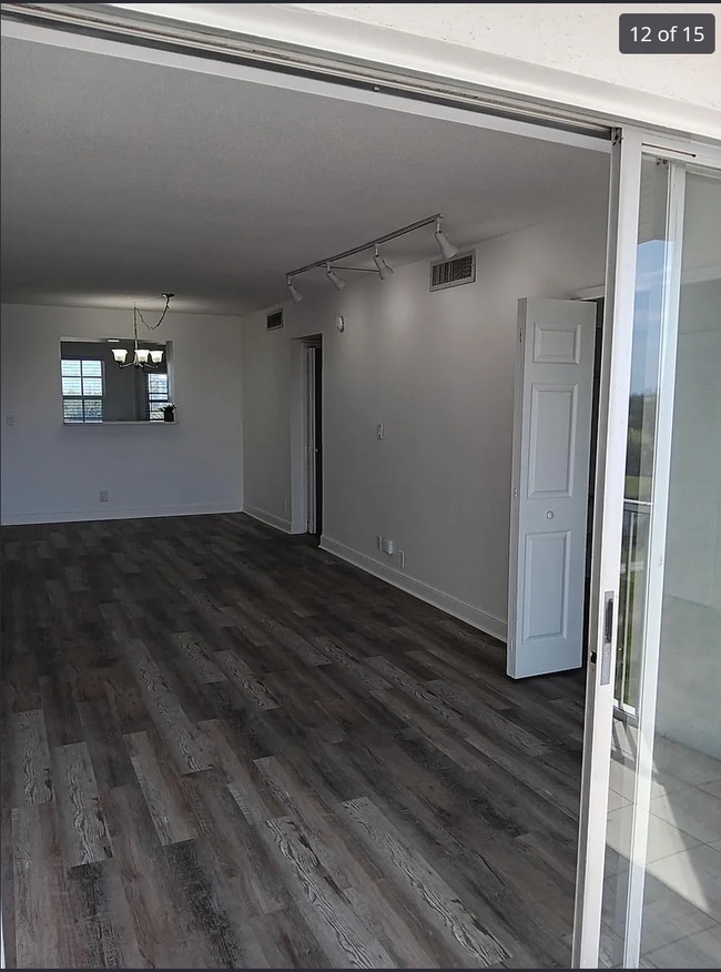 main living space - 3050 N Palm Aire Dr Unit 702