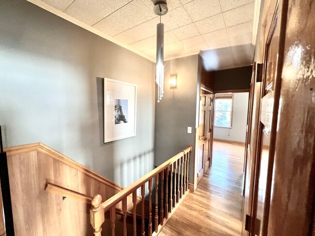 Building Photo - 8528 67th Dr Unit Top floor Rental
