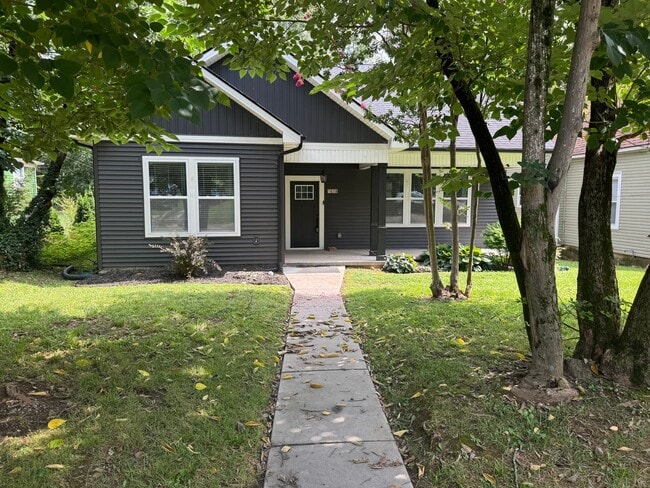 Building Photo - Modern Bungalow Charm: Designer Finishes & Expansive Backyard Living!