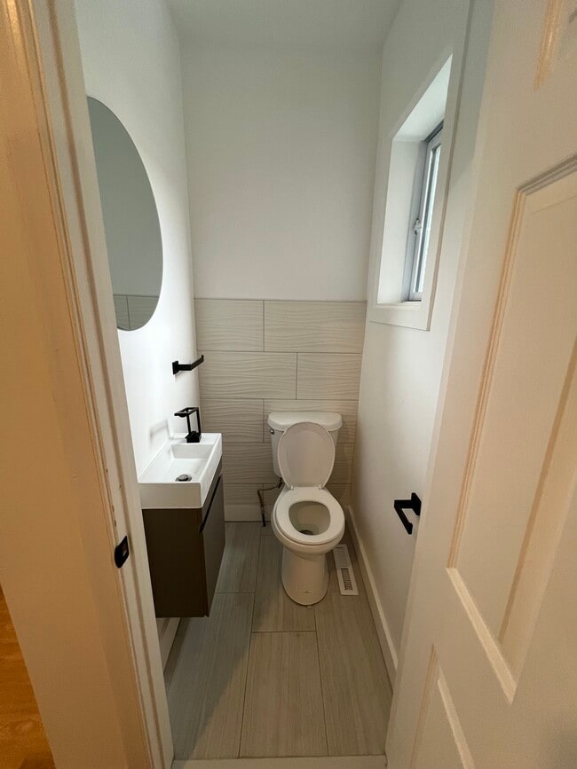 Half Bathroom on the first floor. - 3025 N 21st St