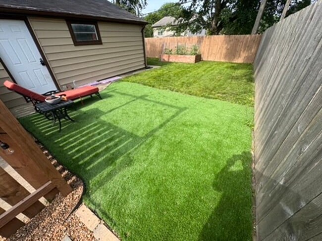 Photo - AVAILABLE SEPTEMBER 1: Updated 4-bedroom single family home on a quiet block- with 2 kitchens, 2 ...