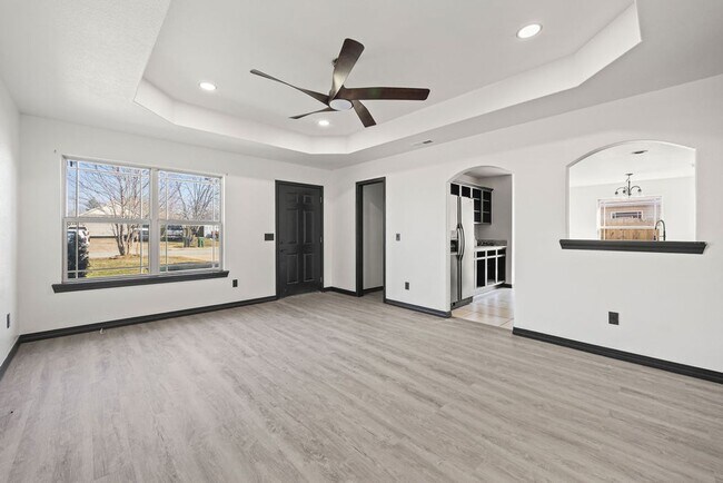 Photo - Charming 3-Bed Home in Rogers – Spacious Yard, Modern Comfort, Great Location