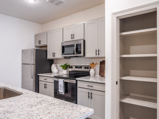 The Perdido: 1BR, 1BA- Kitchen - The Flats at Ransley