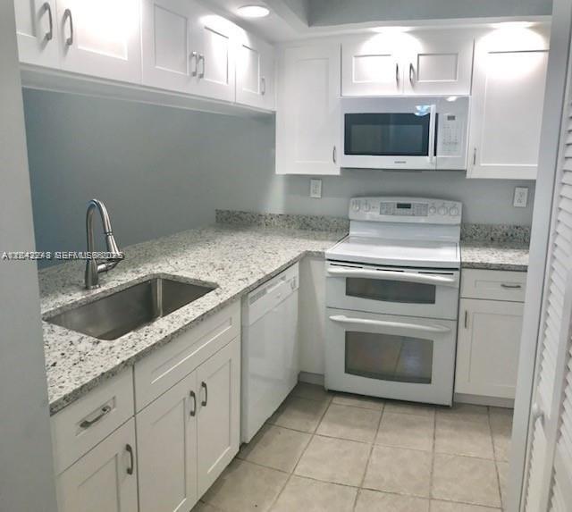 Building Photo - 6800 Cypress Rd Unit 407