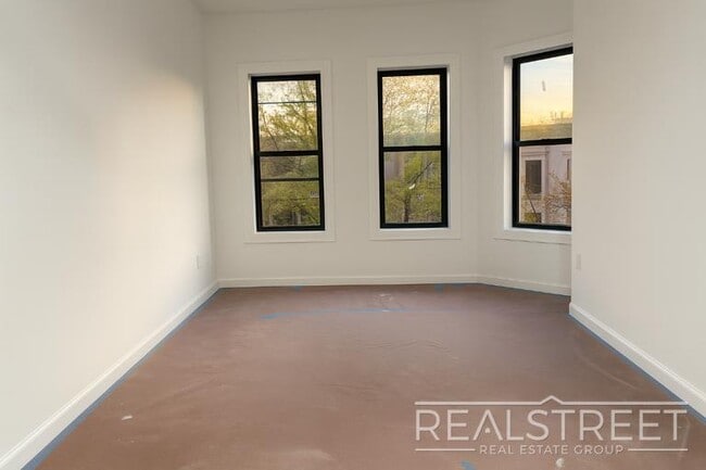 Photo - Stylish 1-Bedroom Apartment with Modern Amenities in Bed-Stuy
