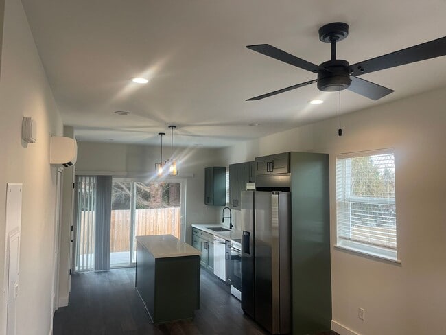 Photo - Brand new 2 bed/2 bath, central a/c, dishwasher, washer & dryer, deck & patio!