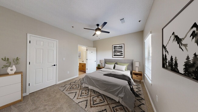Cozy bedroom with ensuite bathroom.