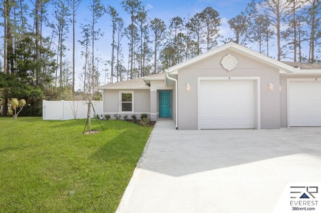Building Photo - FULLY FENCED, LIKE- NEW 3/2/1 TOWNHOUSE ON A CUL DE SAC IN BEAUTIFUL SEMINOLE WOODS