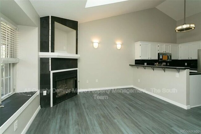 Building Photo - 9617 W Chatfield Ave Unit E