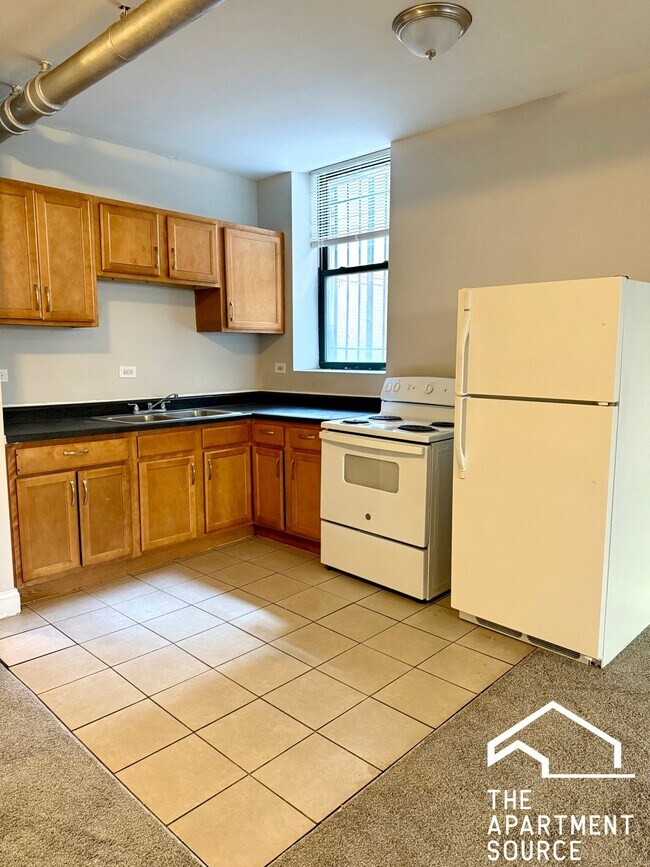 Photo - 2211 E 69th St Unidad 2211 East 69th St