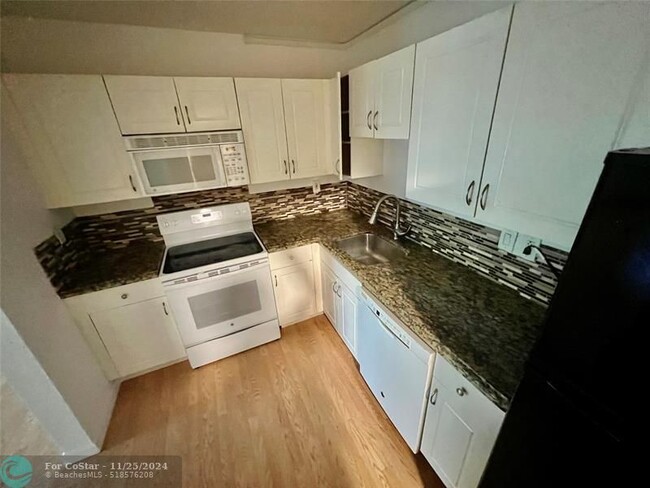 Photo - 760 SE 2nd Ave Condo Unit C202