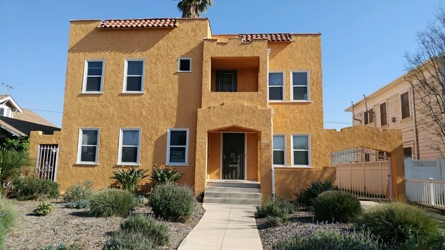 Front of building. Parking garage in rear - 1216 Keniston Ave Unit 1216 Keniston