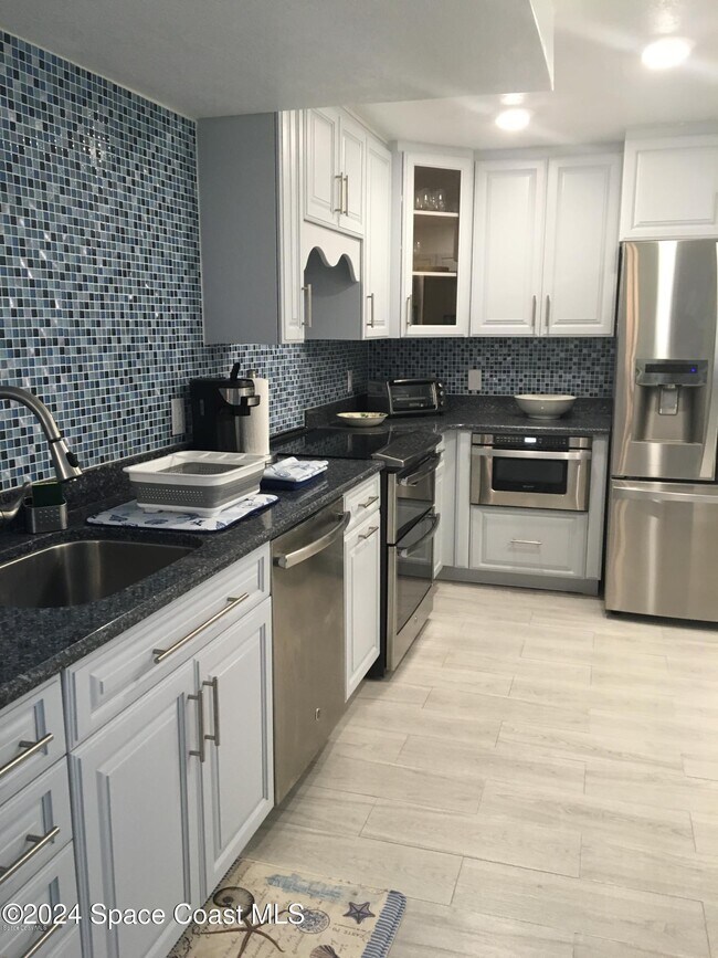 Photo - 3613 S Banana River Blvd Unidad 304