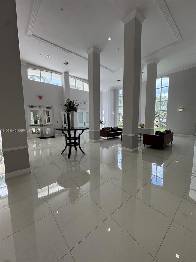 Building Photo - 9725 NW 52nd St Unit 114