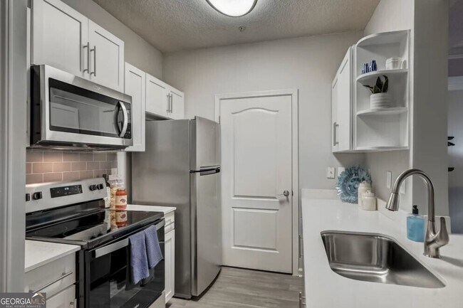 Building Photo - 2900 Pharr Ct S Northwest Unit 2213 Rental