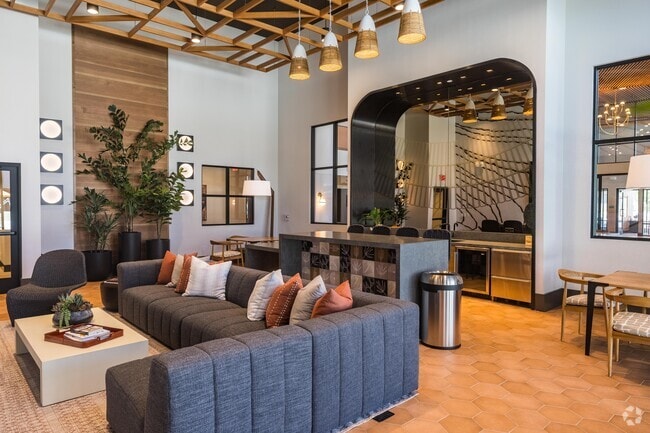 Speakeasy Sports Lounge with TV Viewing Wall and Bar