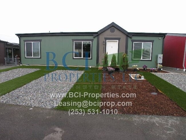 Building Photo - Welcome Home to Evergreen Place Condominiu...