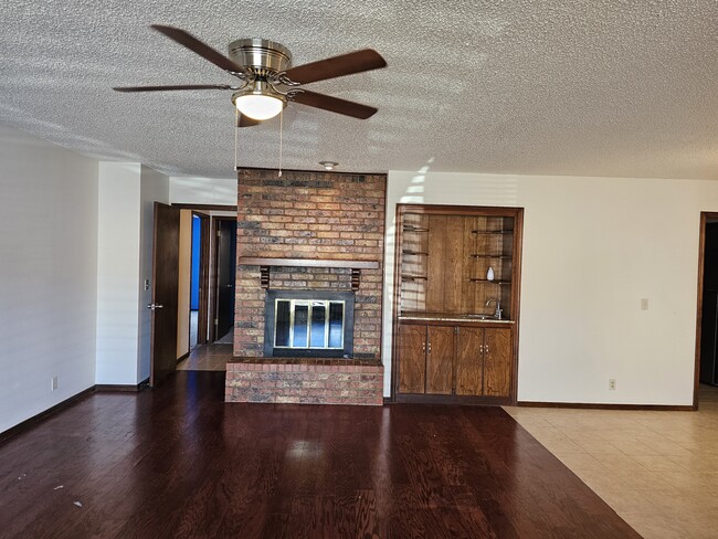 Livingroom with wood burning fireplace - 2104 NW 118th Ter Townhome