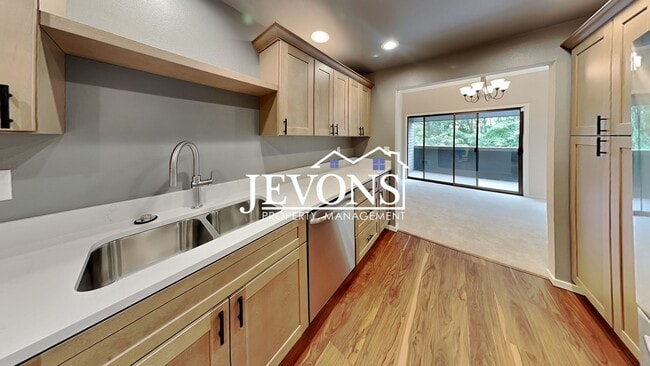 Photo - Top-floor 2-level condo with brand-new kit...