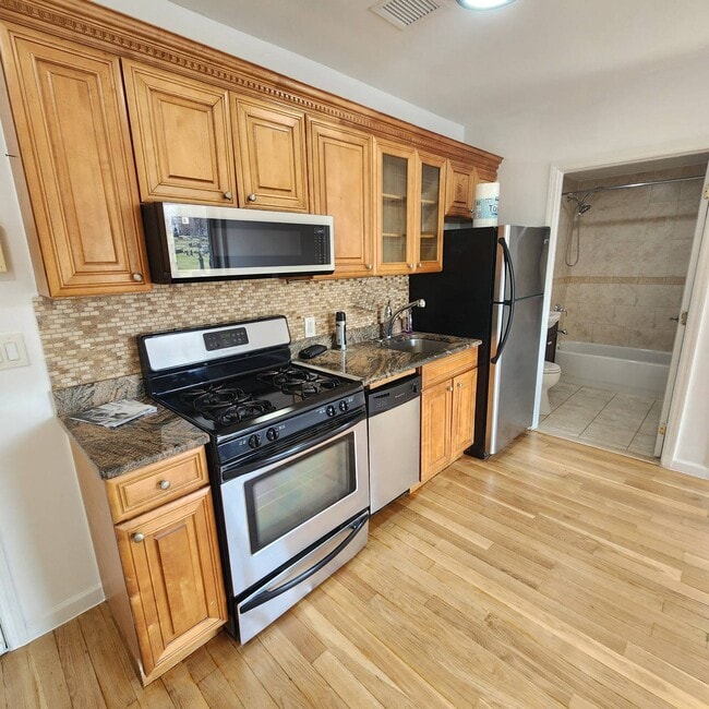 Photo - 66-83-83 70th St