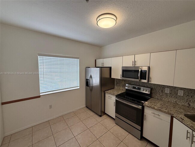 Photo - 5620 NW 114th Path Unit 201