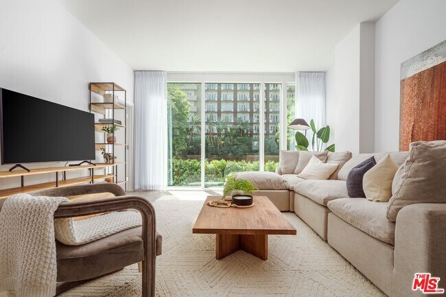 Building Photo - 9000 W 3rd St Unit 211