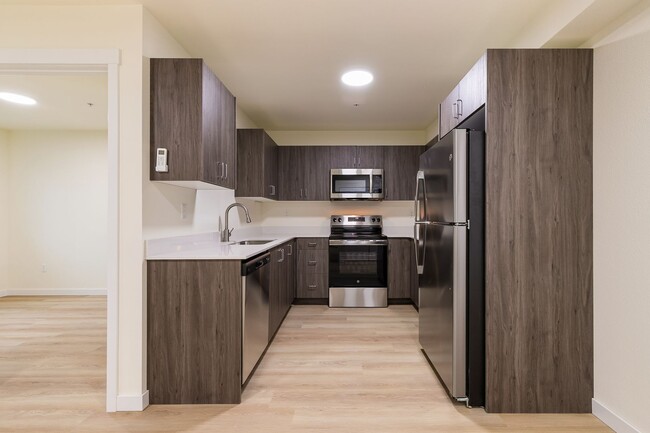 Photo - Brand New Apartments for Rent | 1, 2 & 3 Bedrooms Available | Parking + Patios - ONE MONTH FREE!