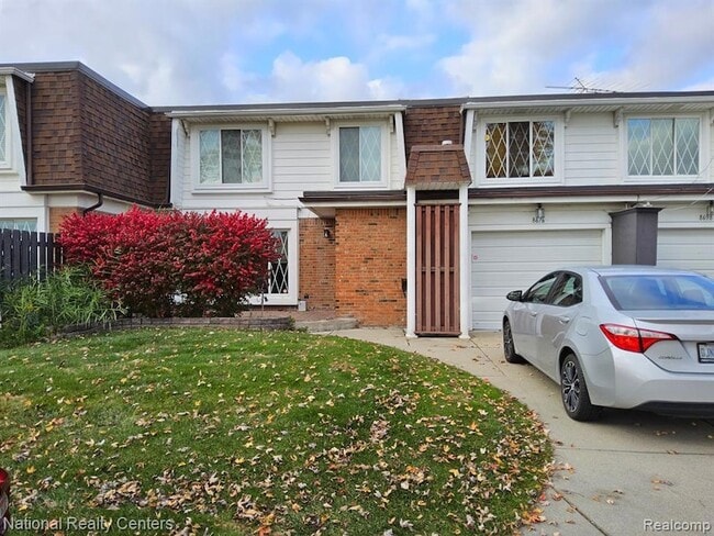 Building Photo - 8676 Community Blvd Unit 2