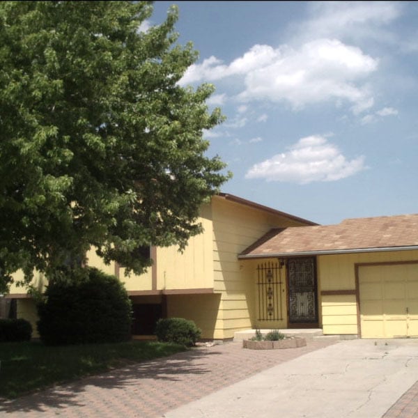 Building Photo - Widefield side entry bi-level home.