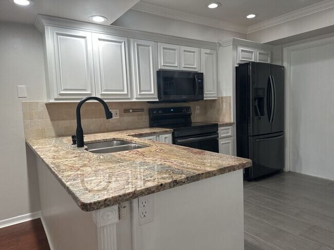 Photo - CARROLLWOOD VILLAGE REMODELED TOWNHOUSE