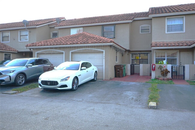 Building Photo - 6380 W 24th Ct