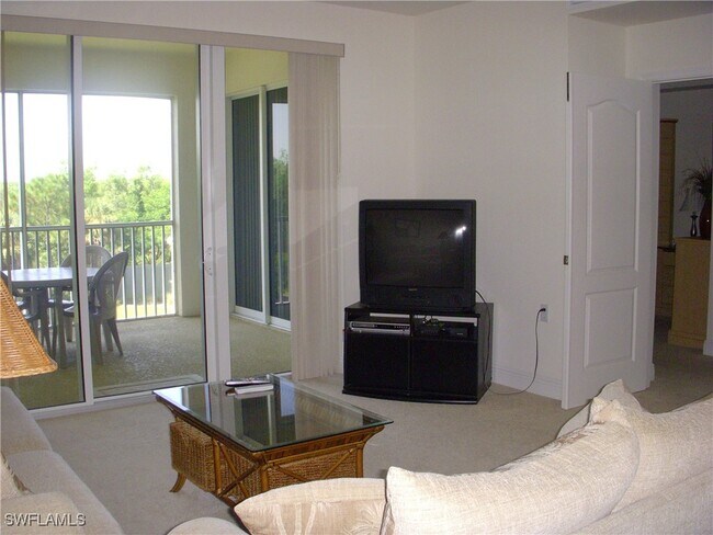 Building Photo - 11021 Gulf Reflections Drive Unit 303 Rental