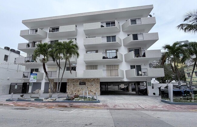 Building Photo - 6965 Harding Ave Unit 401