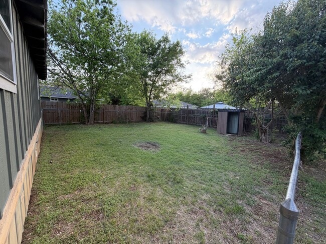 Photo - Charming 2BR/1BA Home with Fenced Yard & Mature Trees in Downtown Blanco!