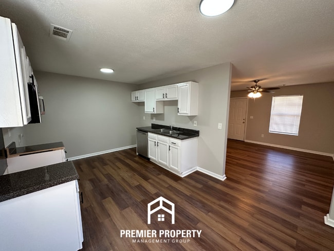 Photo - Spacious 4BR/2BA Home in 38141 | Vinyl Flooring & Large Fenced Backyard