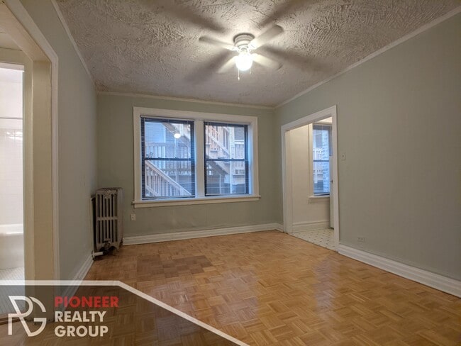 Building Photo - 711 W Belmont Ave