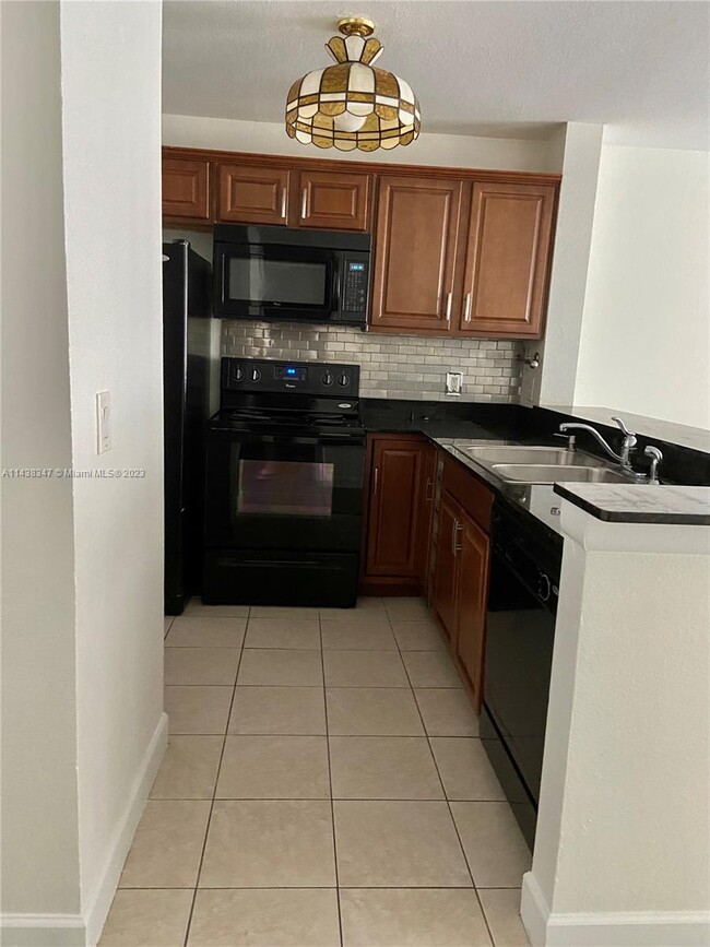 Photo - 1865 Palm Cove Blvd Condo Unit 9-202