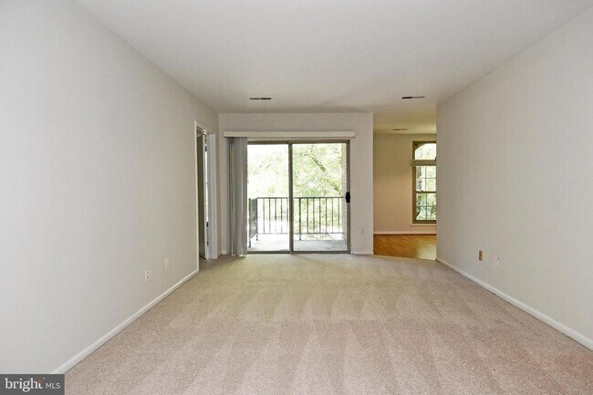 Photo - Commuter friendly location has easy access to I495 & Route 50. Metro bus stop in community.