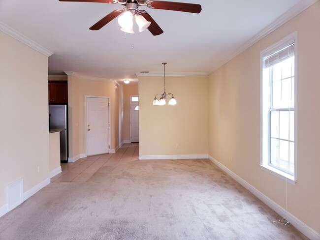 Photo - 3 bedroom town home for rent early January 2026, gated community with a garage for $1725 per month