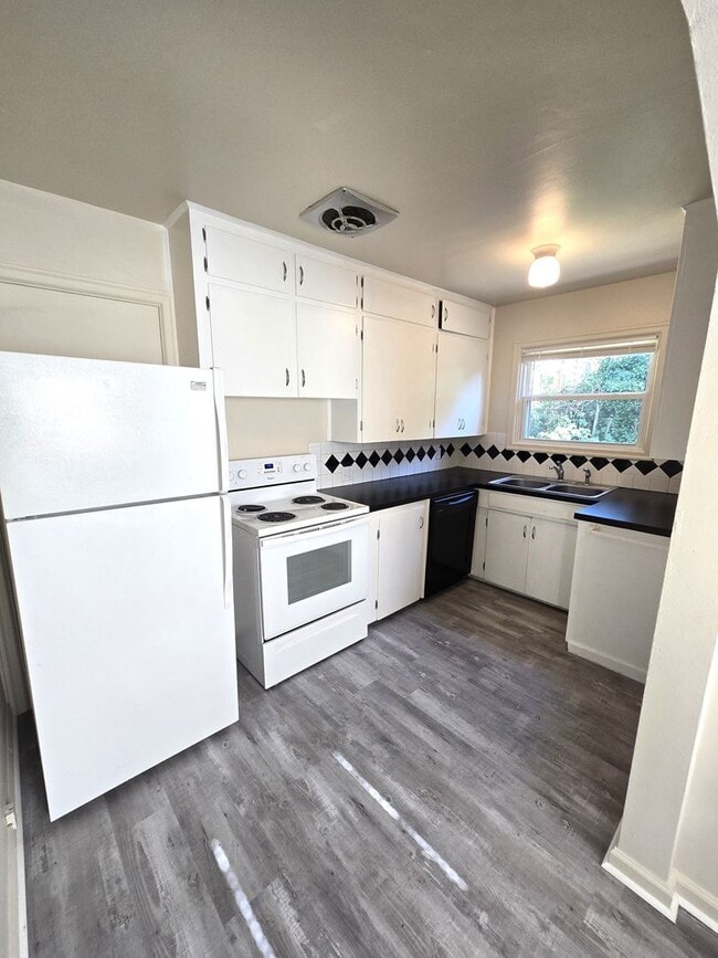 Photo - Great Location!  Updated, Two Car garage, Fenced Backyard !