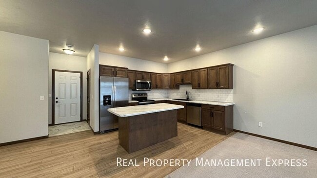 Photo - Modern Luxury: 3BR Townhome with Stylish F...