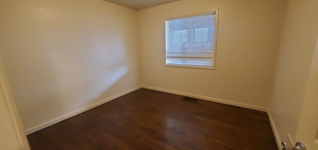 Photo - 4 bed, 2 Bath, 1100 SF with washer/dryer hookups, large, fenced yard and garage.