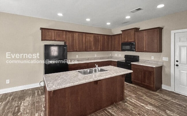 Photo - 4 Bed, 2.5 Bath Home with Garage / Pet-Friendly / Available Now!